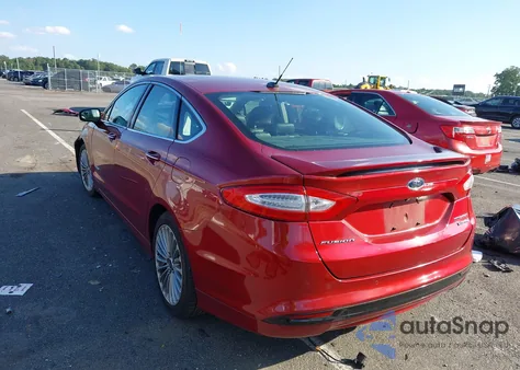 2014 Ford Fusion Hybrid Titanium from USA, damaged, VIN 3FA6P0RU4ER372059